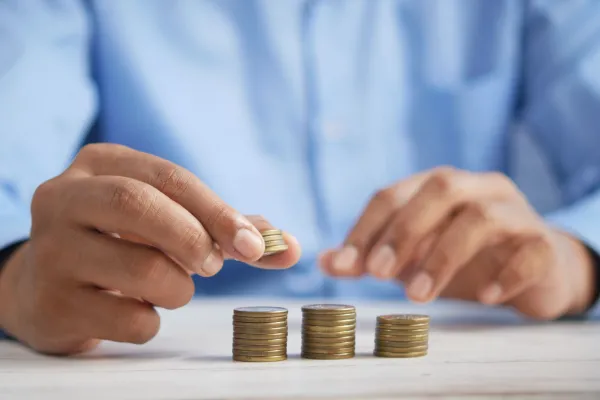 man with coins